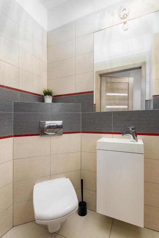 Kúpeľňa v ubytovaní Al Krakowska 291A by Homeprime