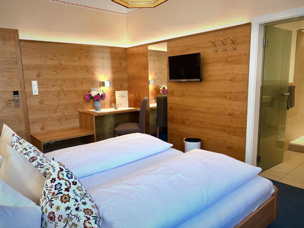 TV a/nebo společenská místnost v ubytování Hotel Plainbrücke | self check-in