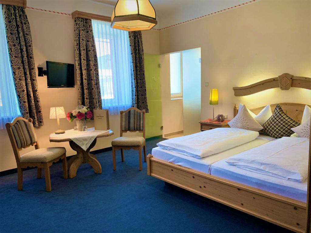 Postel nebo postele na pokoji v ubytování Hotel Plainbrücke | self check-in