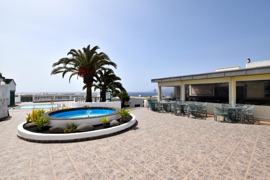 Fotografie z fotogalerie ubytování Colina del Sol Lanzarote Pool with sea view v destinaci Tías