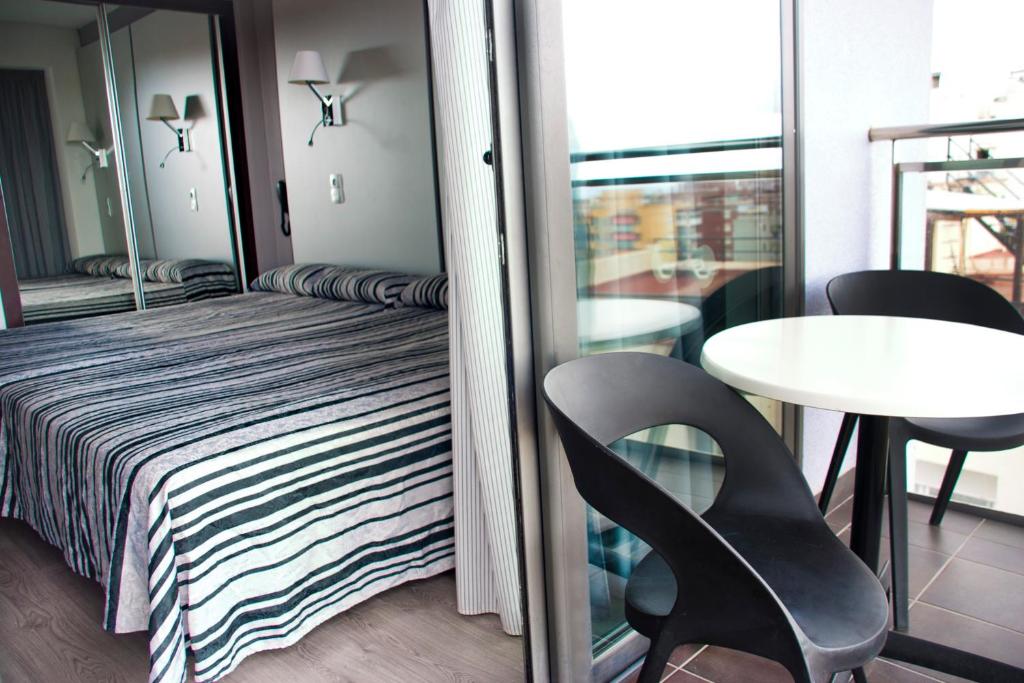 Postel nebo postele na pokoji v ubytování Summer Hotel