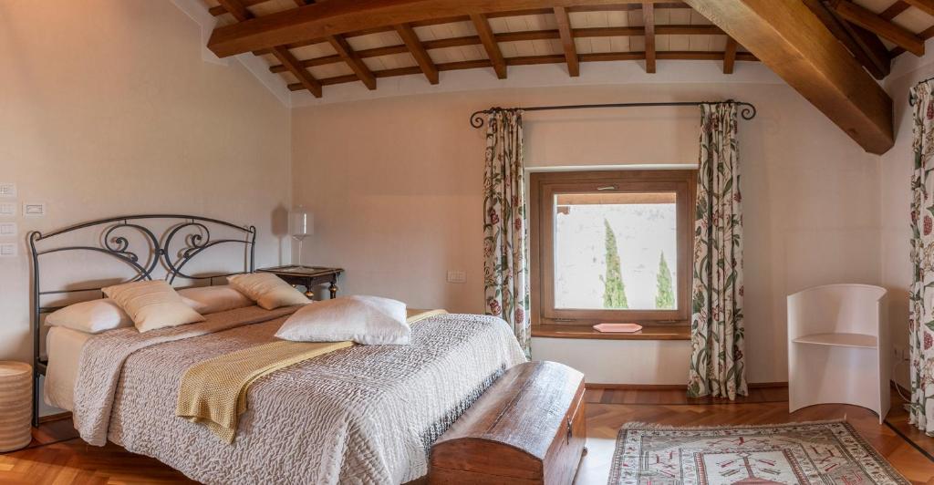 Posteľ alebo postele v izbe v ubytovaní Villa della Giovanna by VacaVilla