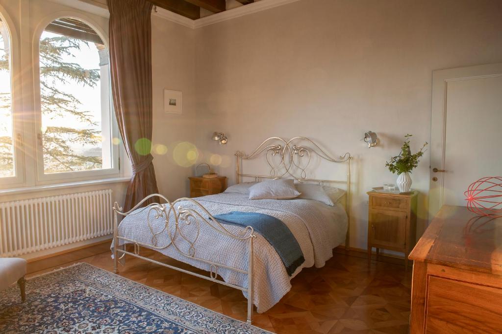 Posteľ alebo postele v izbe v ubytovaní Villa della Giovanna by VacaVilla