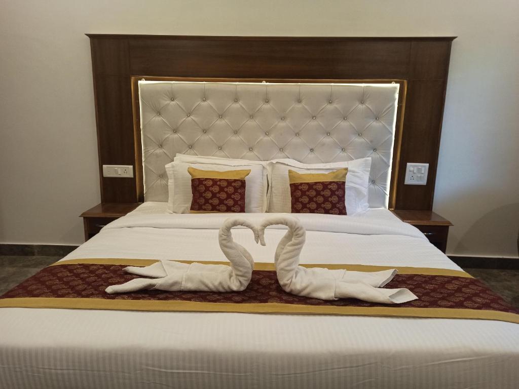 Lova arba lovos apgyvendinimo įstaigoje Corbett Milestone Resort