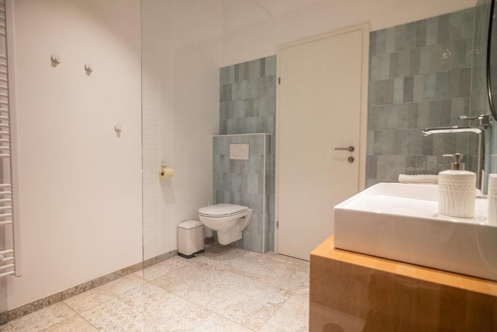Kúpeľňa v ubytovaní Apartments Leopold Ferdinand
