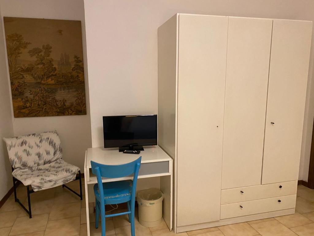 TV a/nebo společenská místnost v ubytování Hotel Le Logge