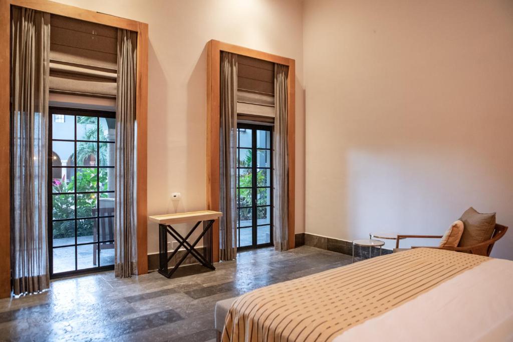 Postel nebo postele na pokoji v ubytování Antelar Casa Destino
