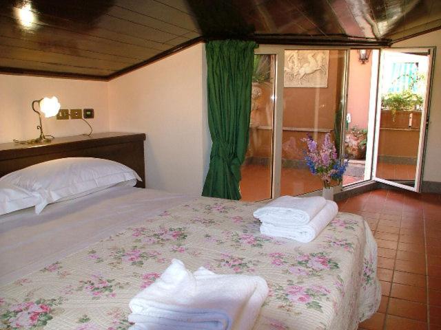Postel nebo postele na pokoji v ubytování Hotel OKAPI