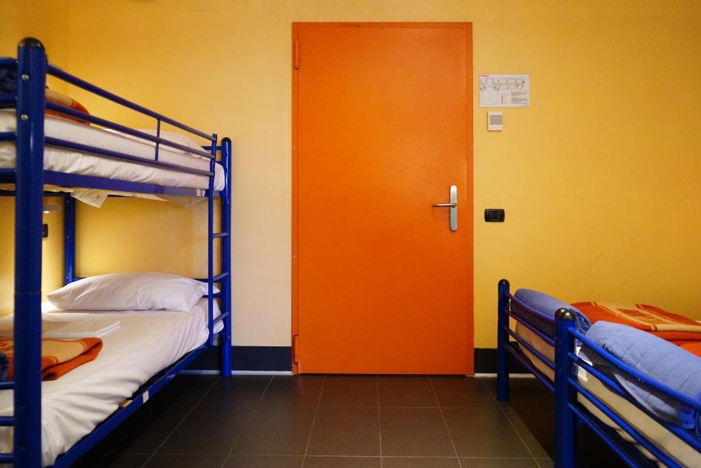 Postel nebo postele na pokoji v ubytování Hi! Ostello Milano