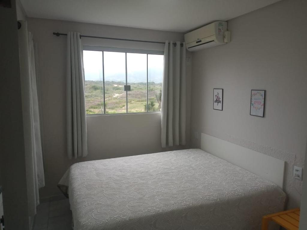 Voodi või voodid majutusasutuse Residencial Mariano 4 - Vista para praia e Mar toas