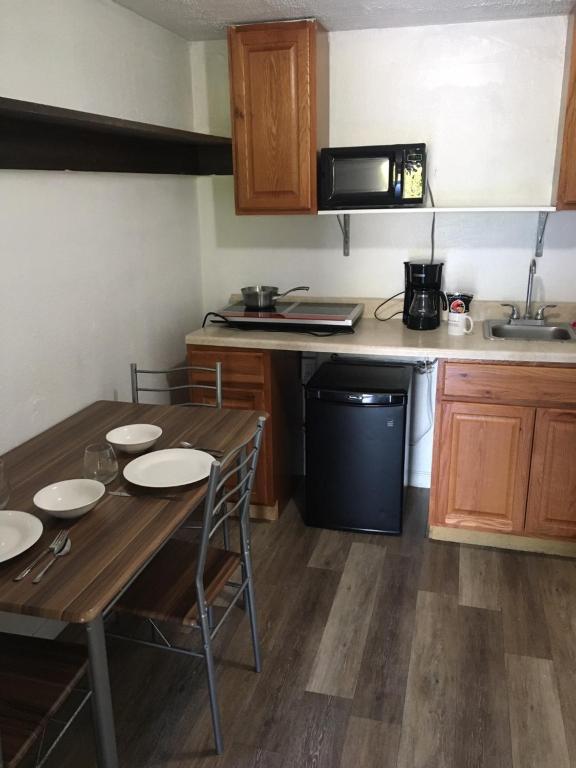 Køkken eller tekøkken på ANS INN & SUITES