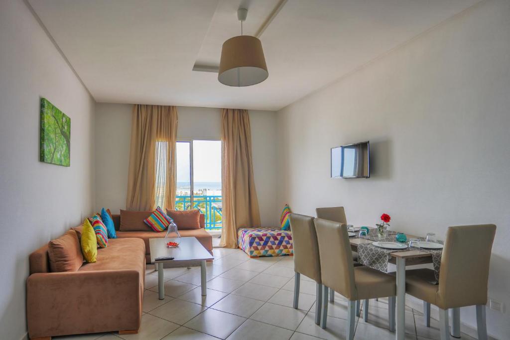 Posezení v ubytování L'escale Appart-hôtel By 7AV HOTELS