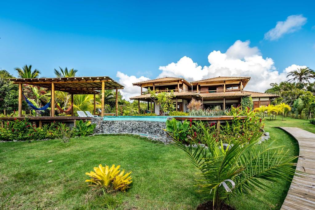 Κήπος έξω από το Casa frente ao mar no melhor local da Barra Grande