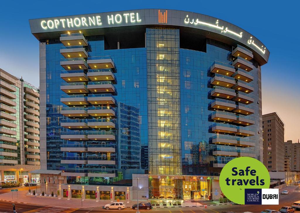 a large building with a lot of windows at Copthorne Hotel Dubai in Dubai