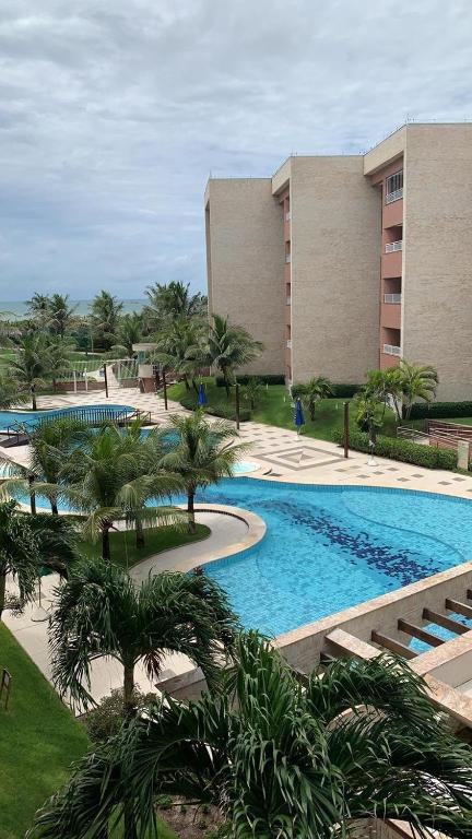  Apartamento em Condomínio Resort vizinho ao Beach Park