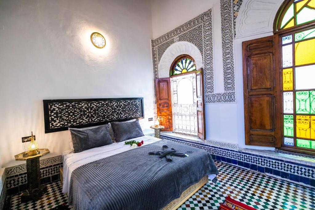 Postel nebo postele na pokoji v ubytování Palais Riad Chahd Luxury