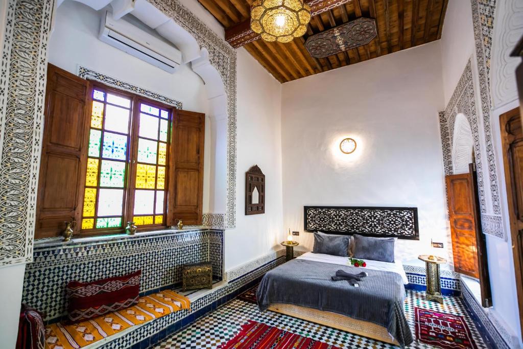 Postel nebo postele na pokoji v ubytování Palais Riad Chahd Luxury