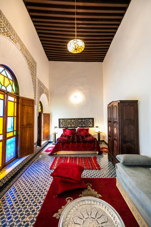 Postel nebo postele na pokoji v ubytování Palais Riad Chahd Luxury