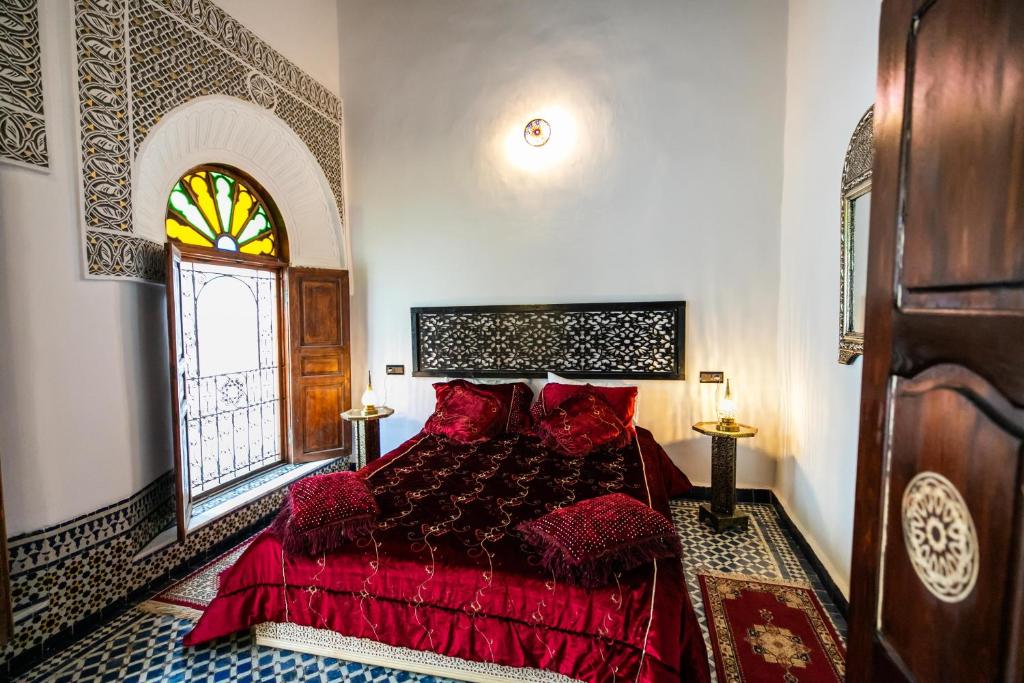Postel nebo postele na pokoji v ubytování Palais Riad Chahd Luxury