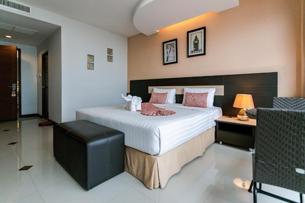 Cama o camas de una habitación en The Centris Hotel Phatthalung