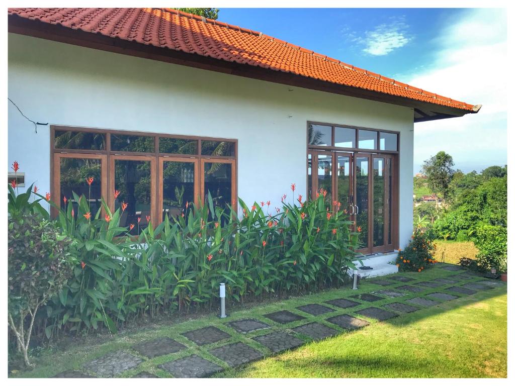 Zahrada ubytování Wake in Paradise and Luxury Lebah Villas