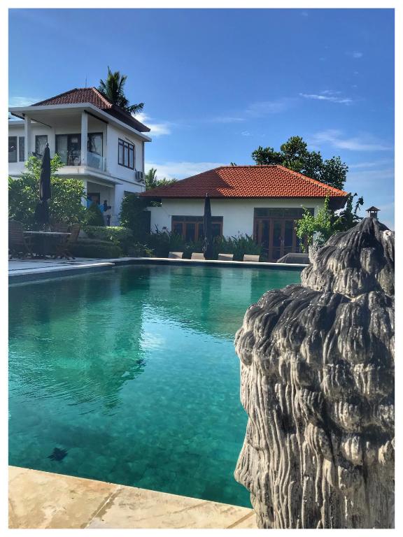 Bazén v ubytování Wake in Paradise and Luxury Lebah Villas nebo v jeho okolí