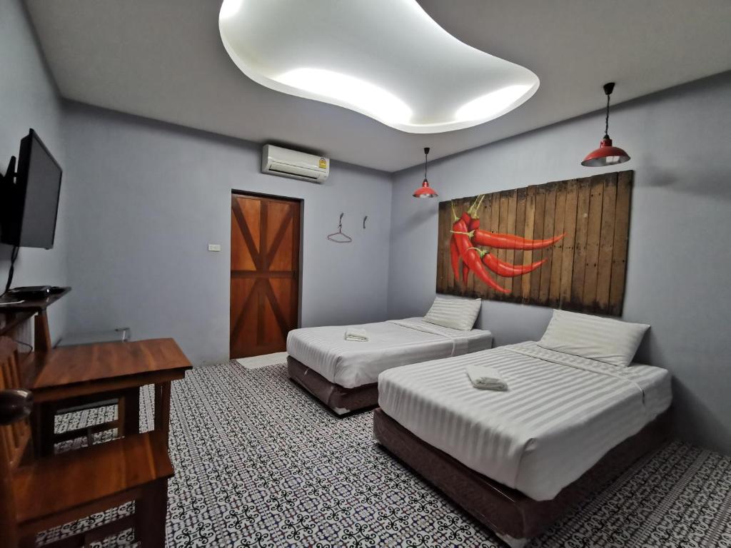 Postel nebo postele na pokoji v ubytování Happy Field Resort