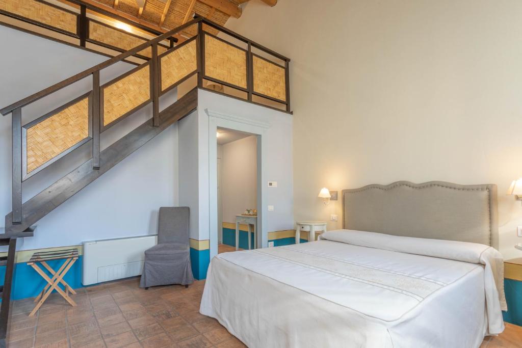 Postel nebo postele na pokoji v ubytování Aquae Sinis Albergo Diffuso