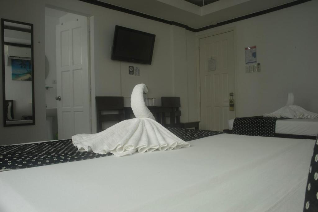 Postel nebo postele na pokoji v ubytování Isla Gecko Resort