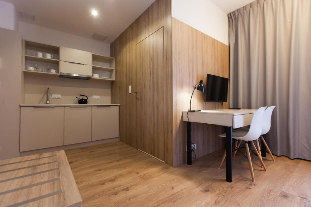 Kuchyňa alebo kuchynka v ubytovaní Aparthotel City Break Wolska