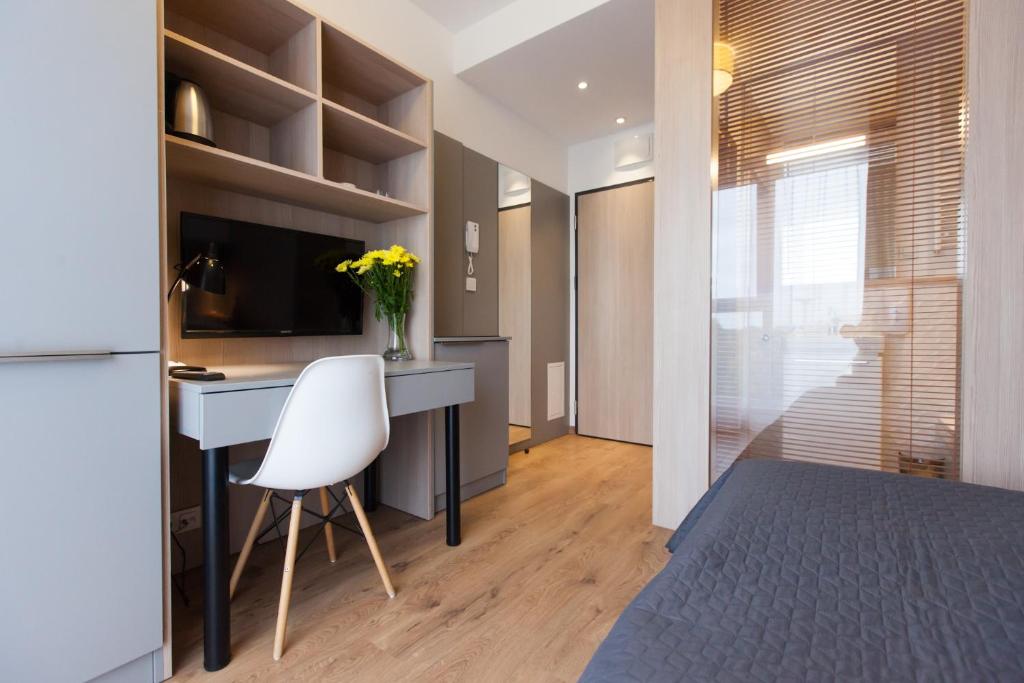Kuchyňa alebo kuchynka v ubytovaní Aparthotel City Break Wolska