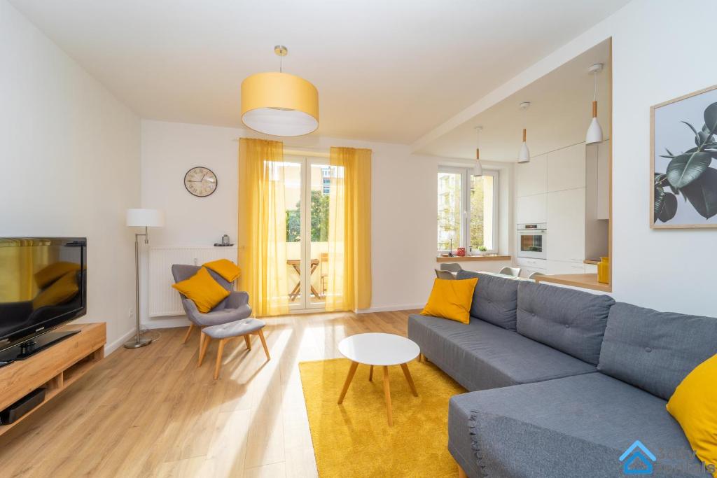 Posedenie v ubytovaní Tradycyjny Apartament 3city w Gdyni z Parkingiem by Noclegi Renters