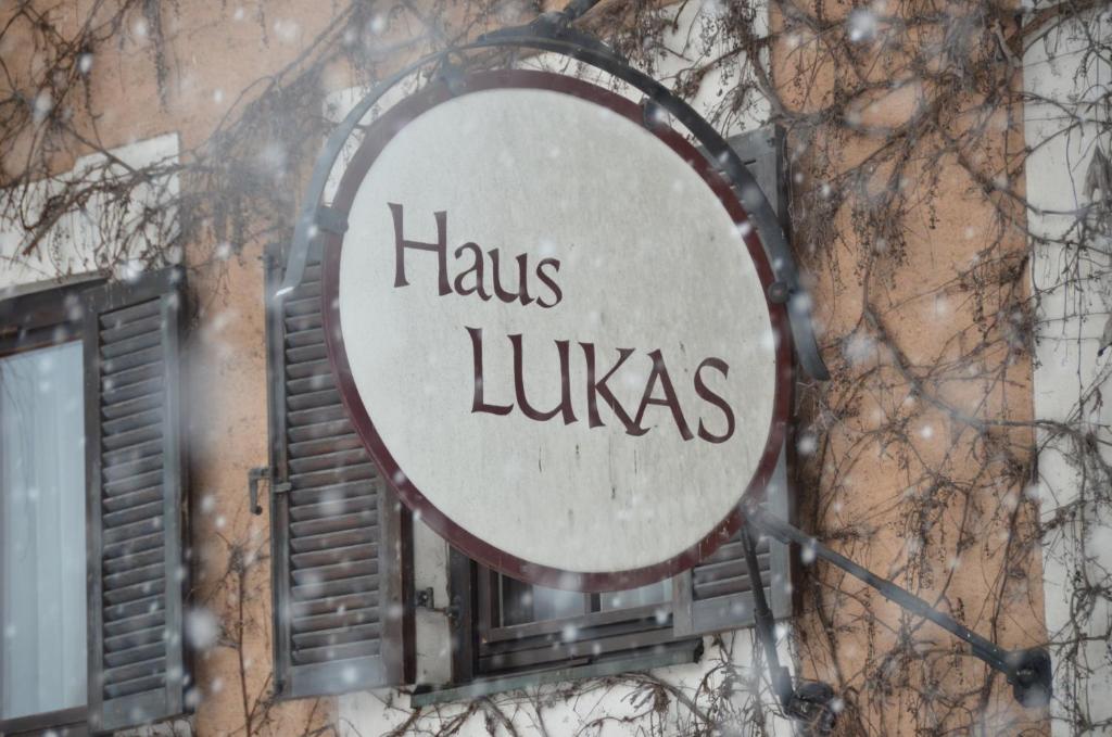 a sign on a building that says haus lucitas at Haus Lukas in Hopfgarten im Brixental