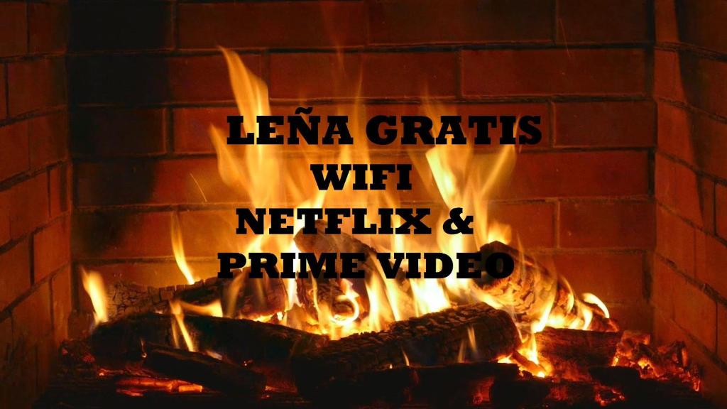 a brick fireplace with the words lava crafts wit netflix and prime video at Vivienda Vacacional Supereda in San Juan de Parres