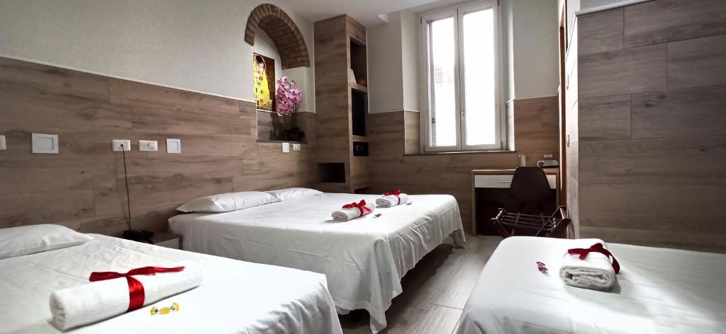 Łóżko lub łóżka w pokoju w obiekcie Eurohotel