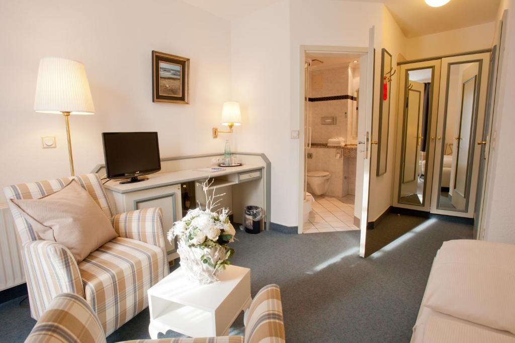 TV a/nebo společenská místnost v ubytování Hotel Friesenhof
