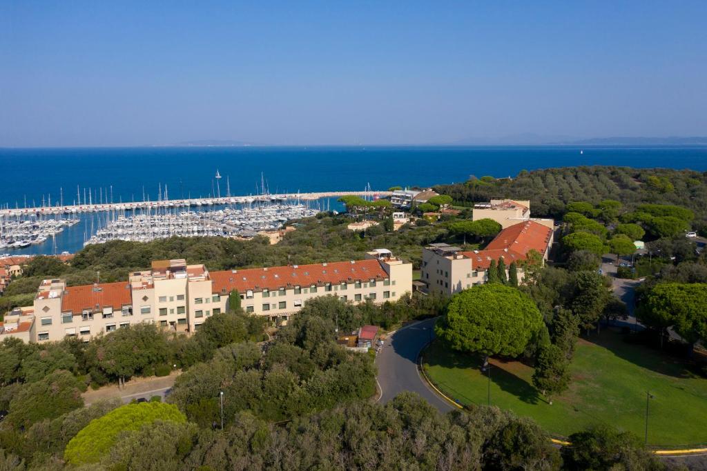 an aerial view of a resort with a marina at Punta Ala Sea View Apartments in Punta Ala