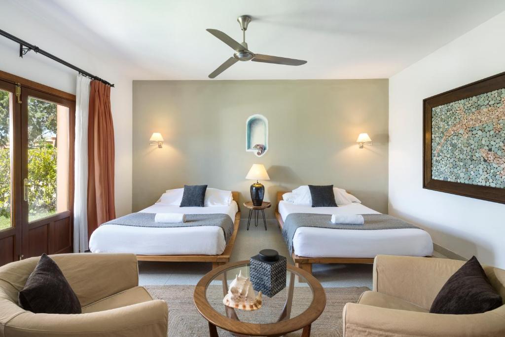 Katil atau katil-katil dalam bilik di Hotel Punta Sur