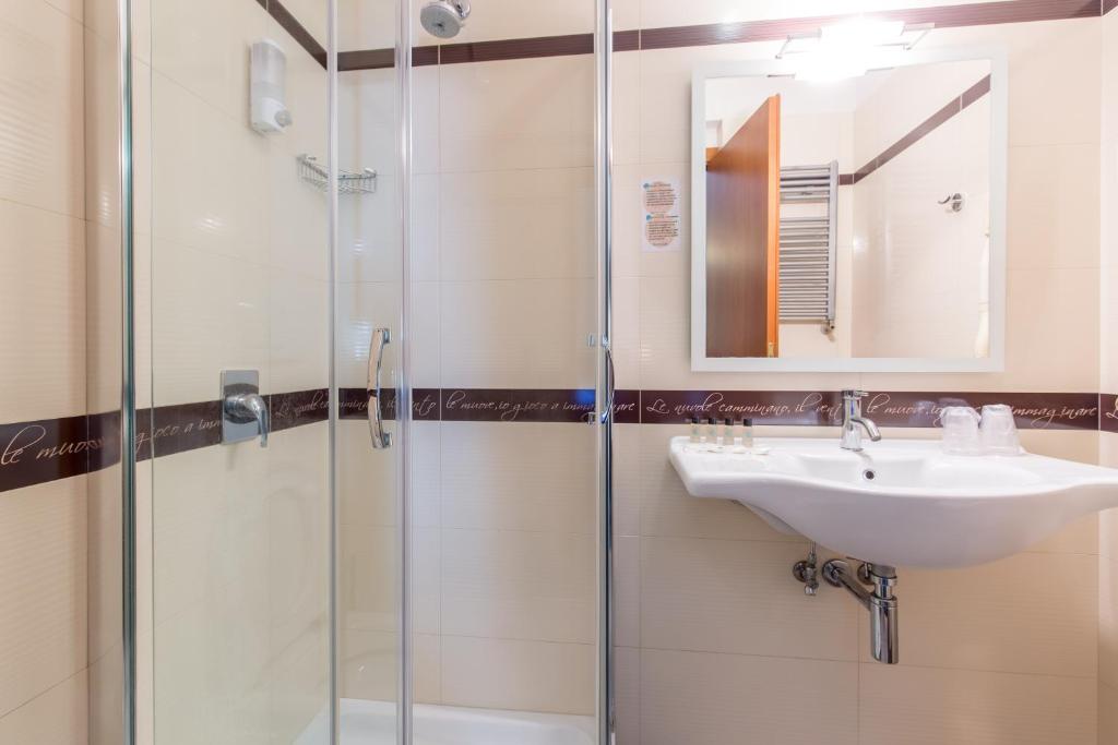 a bathroom with a sink and a shower at Hotel Trastevere in Rome