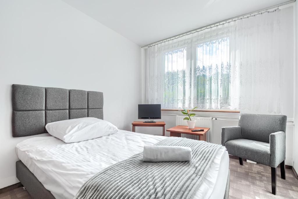 Postel nebo postele na pokoji v ubytování Studencki Dom Marynarza Korab