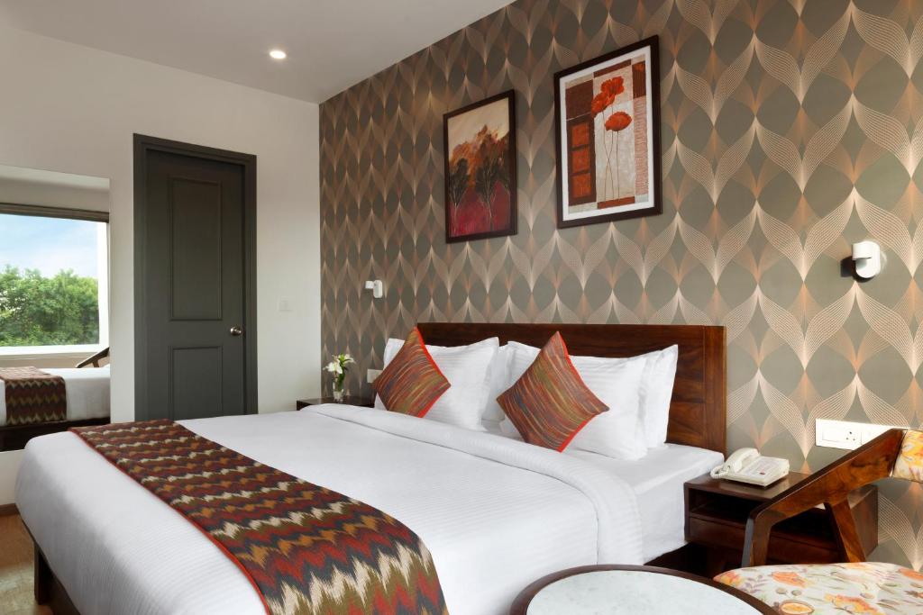 Click Hotel Jaipur, Raja Park客房内的一张或多张床位