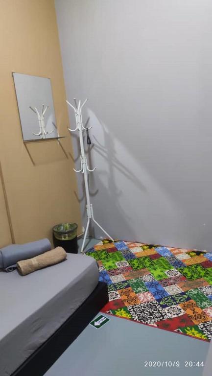 Postel nebo postele na pokoji v ubytování NY TROPICAL BACKPACKERS