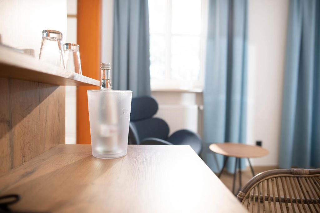 Postel nebo postele na pokoji v ubytování Landhotel Kauzenberg