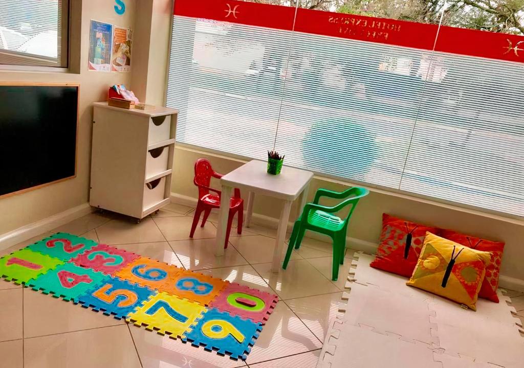 Uma área de estar em Hotel Suárez Executive Novo Hamburgo