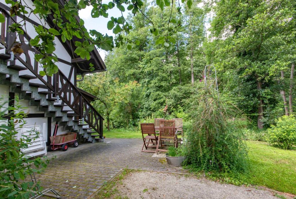 a patio of a house with a table and chairs at Gesundheitsoase in Burg