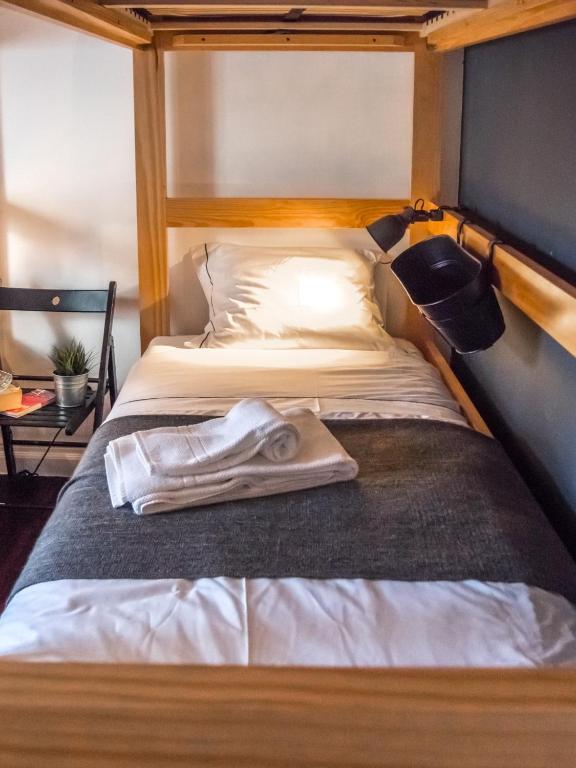 Postel nebo postele na pokoji v ubytování Procyon Boutique & Suites