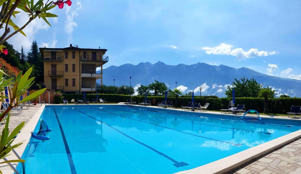 Bazén v ubytování Appartamenti Benaco La Portella by Gardadomusmea nebo v jeho okolí