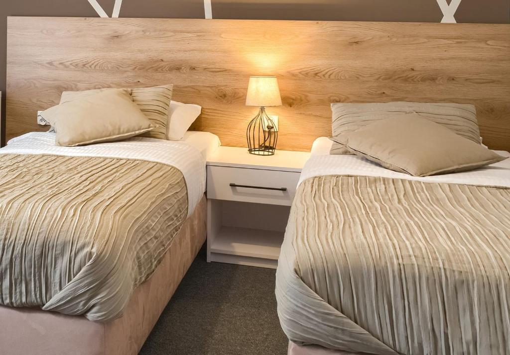 Posteľ alebo postele v izbe v ubytovaní Park Hotel Bydgoszcz