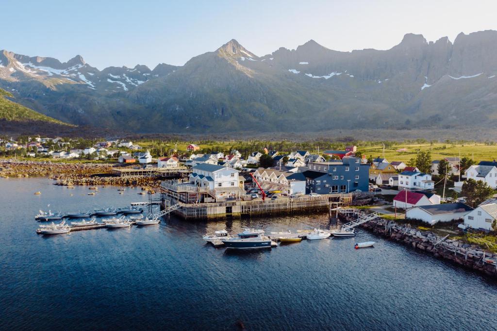 an aerial view of a harbor with boats in the water at Mefjord Brygge in Mefjordvær