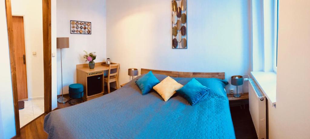 Letto o letti in una camera di Penzion Laterna